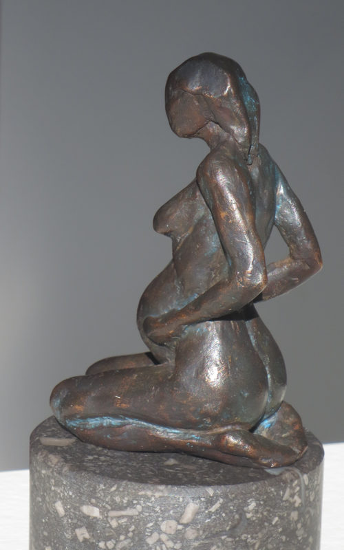 Zwangere zittend